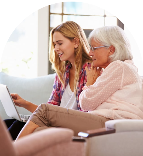 Mother and daughter looking at a laptop