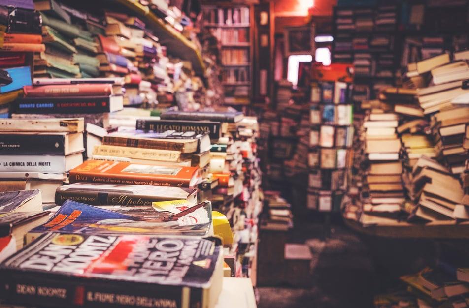 Room full of books and clutter